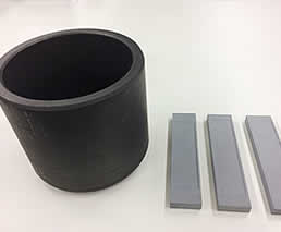 Carbon crucibles and vapor boats